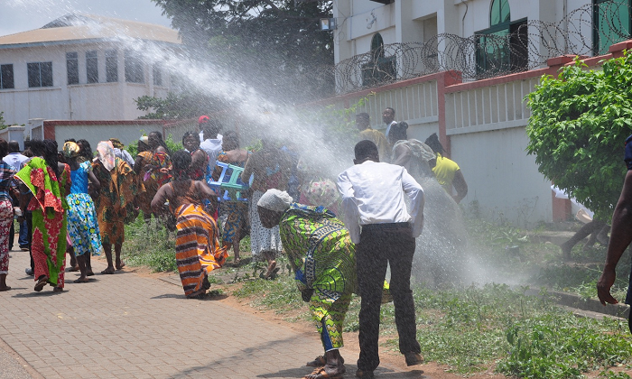 Some of the supporters took to their heels after police scared them off with water canon. Picture: SAMUEL TEI ADANO Some of the supporters took to their heels after police scared them off with water canon. Picture: SAMUEL TEI ADANO